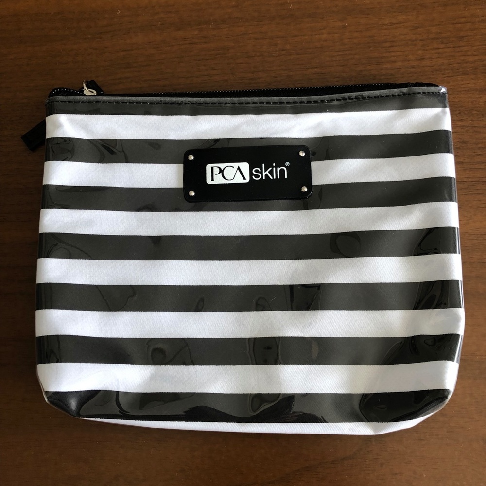NWOT PCA Skin Cosmetic Bag Black & White Striped